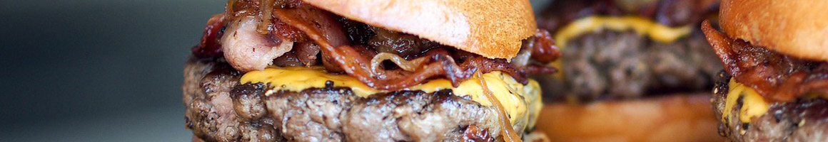 Eating Burger at Boll Weevil Ramona restaurant in Ramona, CA.